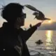 爱吃鱼的恐龙的头像-投影工坊